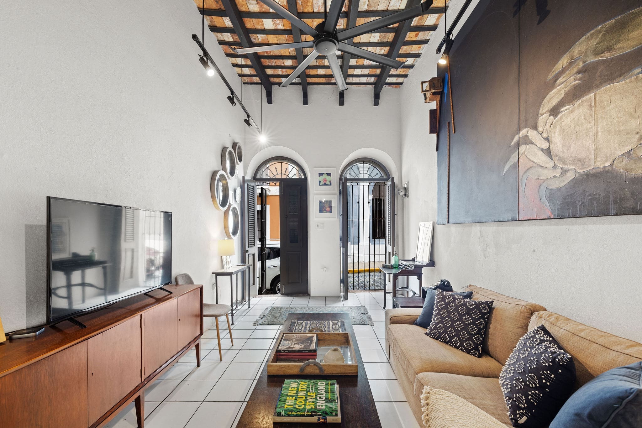 Interior living area with colonial arches in Old San Juan
