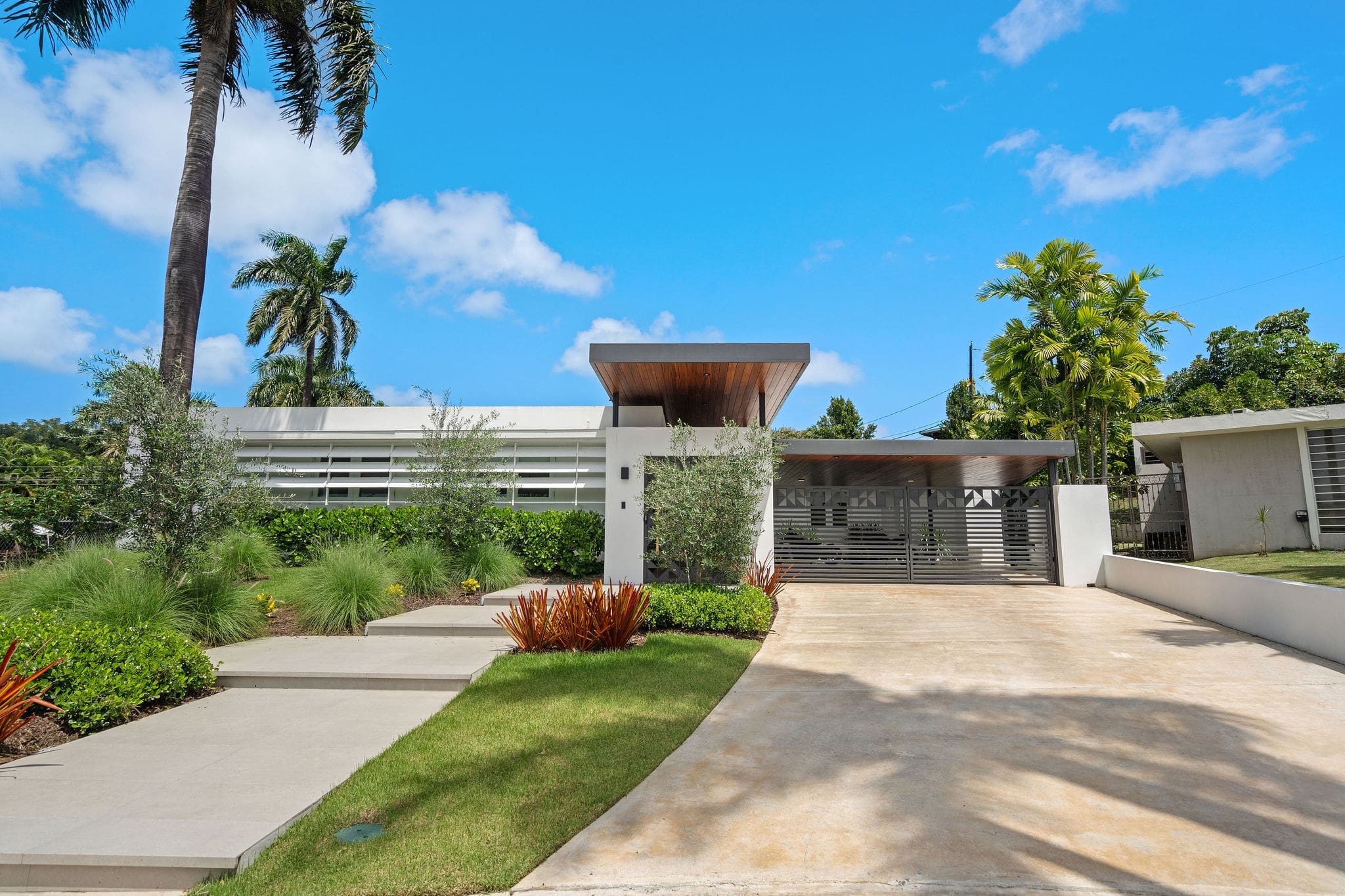 Entrance and driveway of home in Torrimar neighborhood in Guaynabo